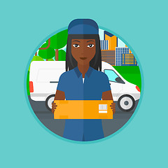 Image showing Delivery woman carrying cardboard boxes.