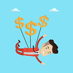 Image showing Businessman flying with dollar signs.