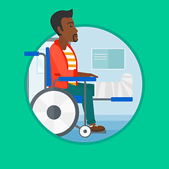 Image showing Man with broken leg sitting in wheelchair.