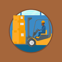 Image showing Warehouse worker moving load by forklift truck.