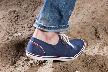 Image showing Man\'s Legs And Footprint On The Sand