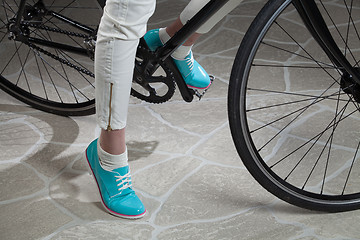 Image showing Woman\'s Legs And Bicycle