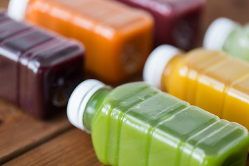 Image showing bottles with different fruit or vegetable juices