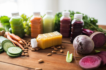 Image showing bottles with different fruit or vegetable juices