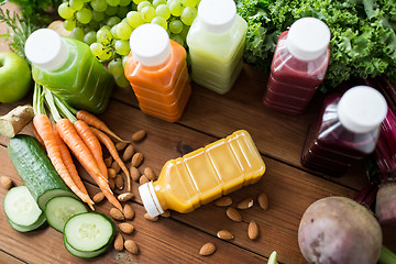 Image showing bottles with different fruit or vegetable juices