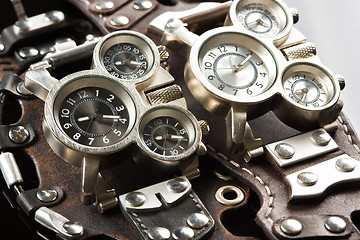 Image showing unusual watches. several alternatives dials