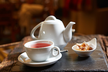 Image showing white teapot with tea Cup, saucer and teaspoon