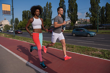 Image showing multiethnic group of people on the jogging