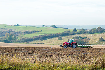 Image showing Tractor Ploughing Field