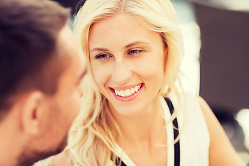 Image showing happy couple faces at restaurant