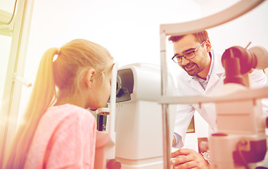 Image showing optician with tonometer and patient at eye clinic