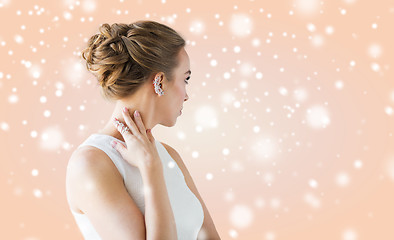 Image showing close up of beautiful woman with ring and earring