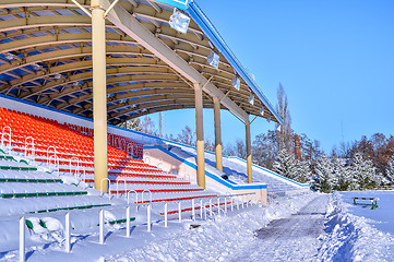 Image showing Background chairs at stadium , winter