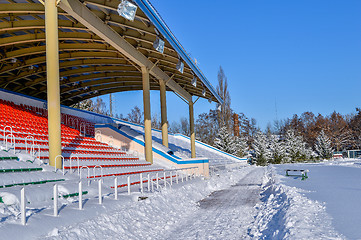 Image showing Background chairs at stadium , winter