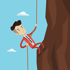 Image showing Businessman climbing on the mountain.