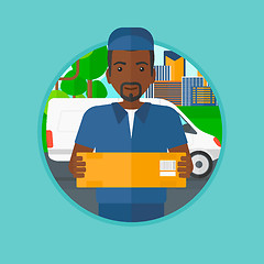 Image showing Delivery man carrying cardboard boxes.