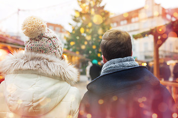 Image showing close up of couple in old town at christmas