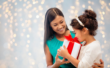 Image showing happy mother and child girl with gift box