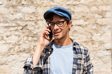 Image showing close up of man calling on smartphone outdoors 