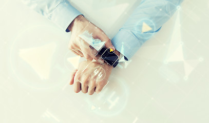 Image showing hand with smartwatch and virtual screen projection