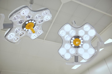 Image showing surgical lamps in operation room at hospital