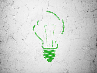 Image showing Finance concept: Light Bulb on wall background