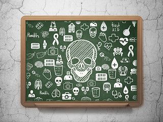 Image showing Health concept: Scull on School board background