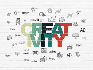 Image showing Advertising concept: Creativity on wall background