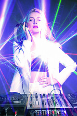 Image showing Beautiful blonde DJ girl on decks - the party,