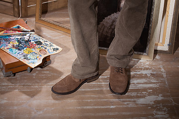 Image showing Man's Legs And Palette With Dyes 