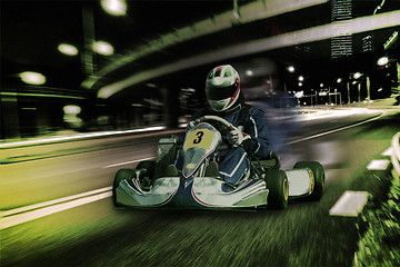 Image showing Karting - driver in helmet on kart circuit