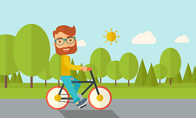 Image showing Man riding a bicycle.