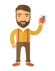 Image showing Happy man holding a red apple.