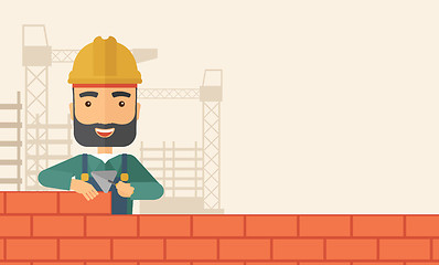 Image showing Builder man is building a brick wall.