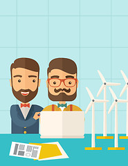 Image showing Workers using laptop with windmills.