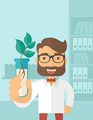 Image showing Chemist with tube and eco leaves.