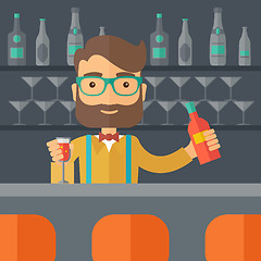 Image showing Bartender at the bar holding a drinks.