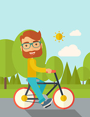 Image showing Man riding a bicycle.