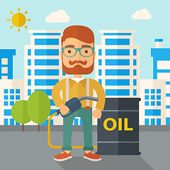 Image showing Businessman with oil can and pump.