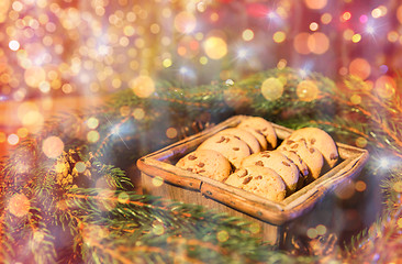 Image showing natural green fir christmas wreath and oat cookies