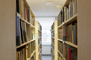 Image showing bookshelves with books at school library