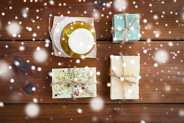 Image showing handmade soap bars on wood