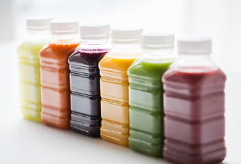 Image showing bottles with different fruit or vegetable juices