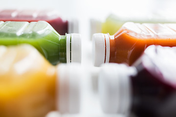 Image showing bottles with different fruit or vegetable juices