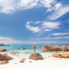 Image showing Woman enjoying Anse Lazio picture perfect beach on Praslin Island, Seychelles.