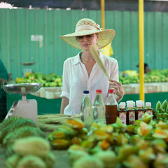 Image showing Traveler shopping on traditional Victoria food market, Seychelles.