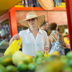 Image showing Traveler shopping on traditional Victoria food market, Seychelles.