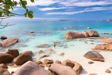 Image showing Woman enjoying Anse Lazio picture perfect beach on Praslin Island, Seychelles.