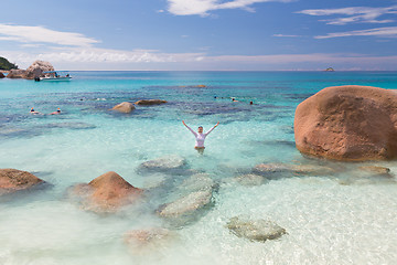 Image showing Woman enjoying Anse Lazio picture perfect beach on Praslin Island, Seychelles.