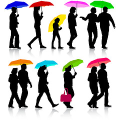 Image showing Color silhouettes man and woman under umbrella. 